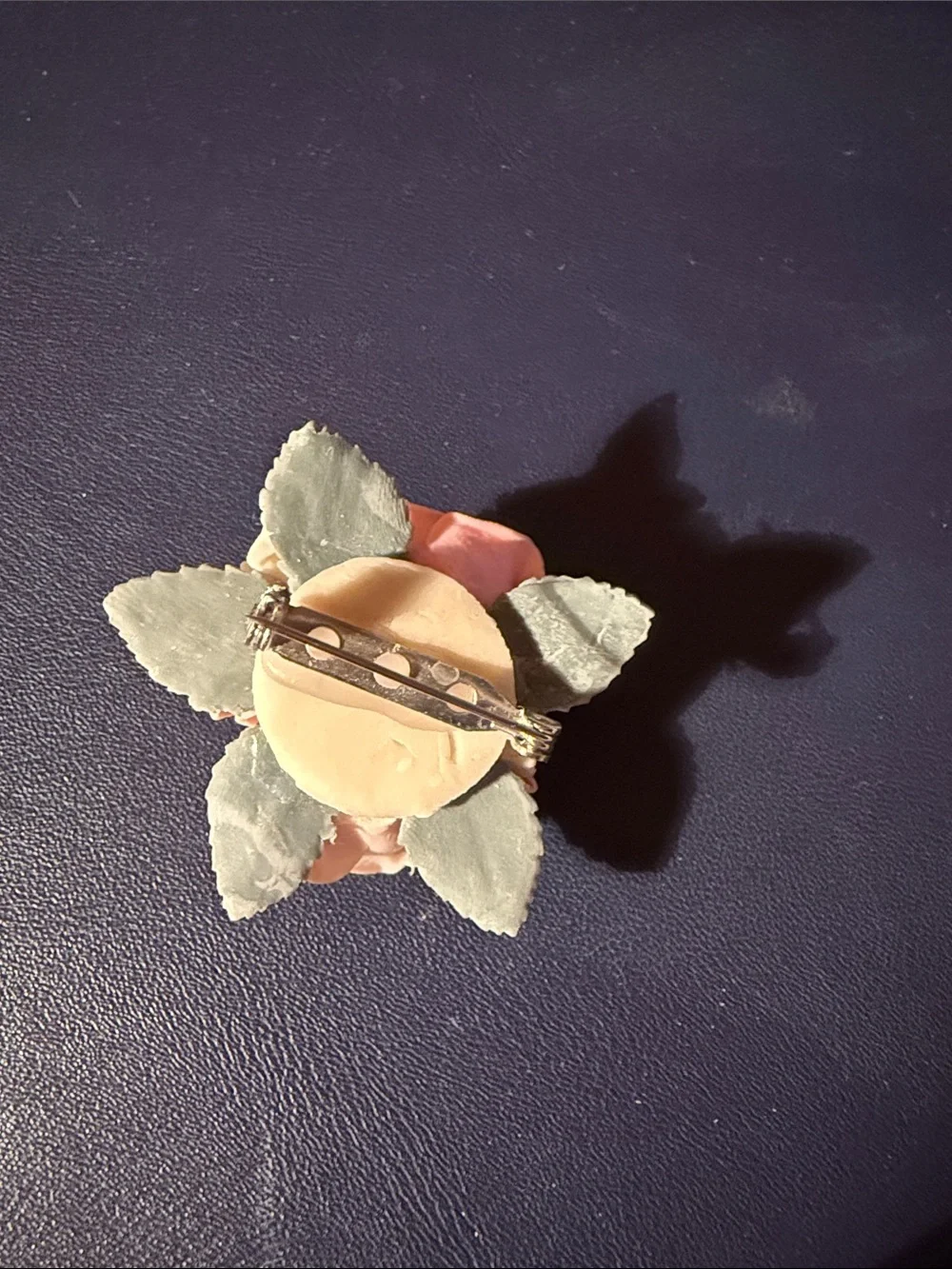 Source Unknown porcelain brooch